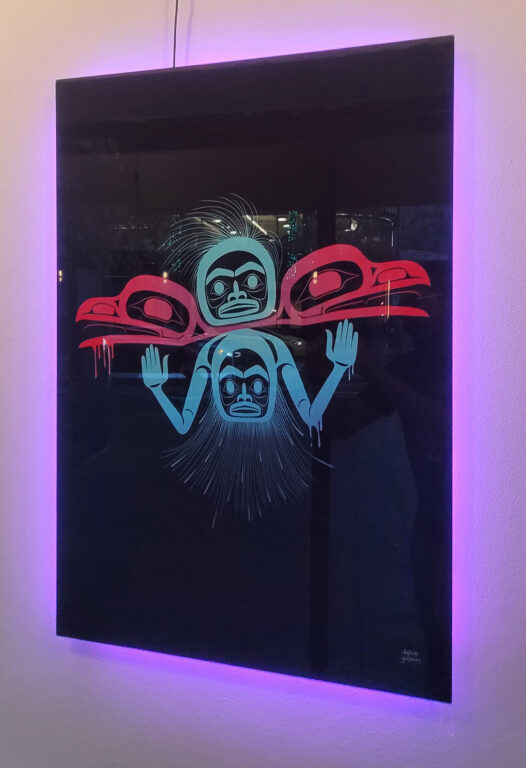 photo of the Tlingit formline art installed with neon lighting