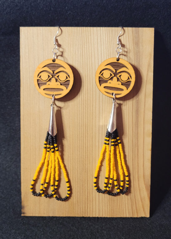 Native American beaded earrings featuring Tlingit Formline moon faces