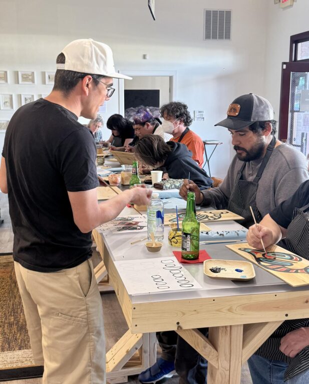 Instruction during the Orca painting class